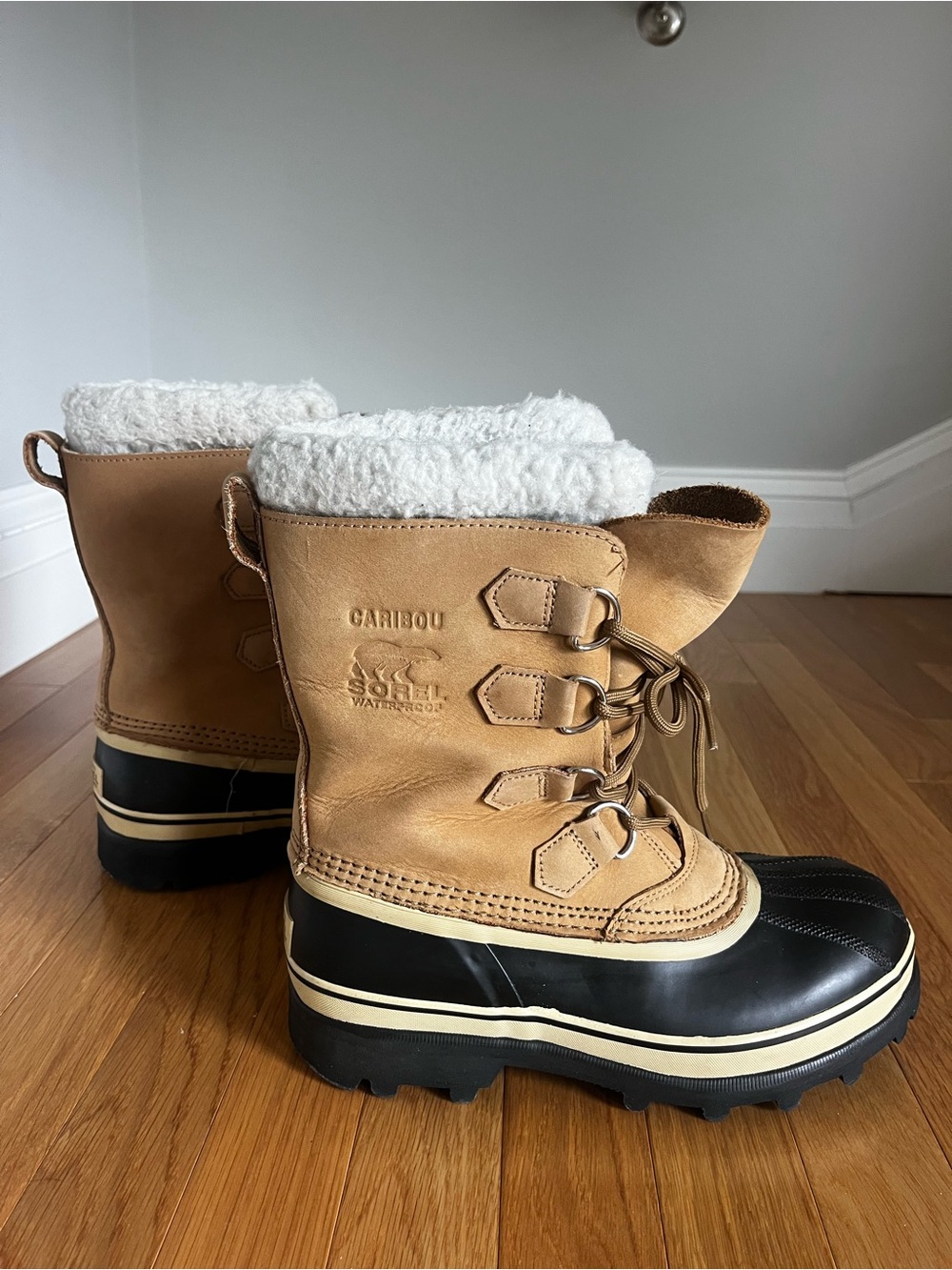 Sorel Tan and Black Caribou Winter Boots
